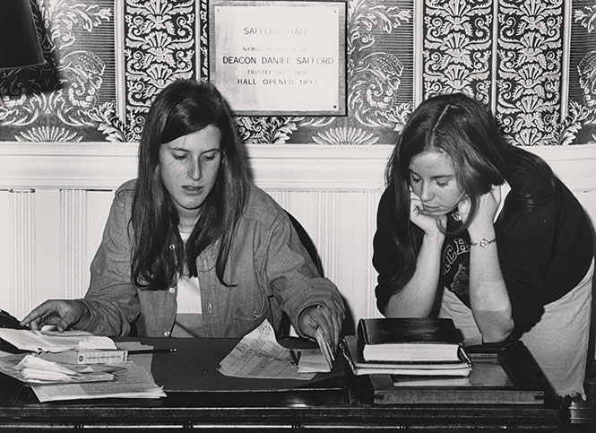 Students at the bell desk in Safford Hall, 1971 Photo courtesy of MHC Archives and Special Collections