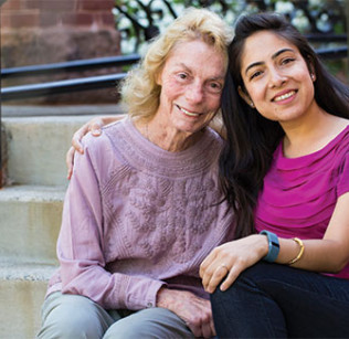 Dana Whyte ’60 and Sandhya Banskota ’10 reconnect during Reunion