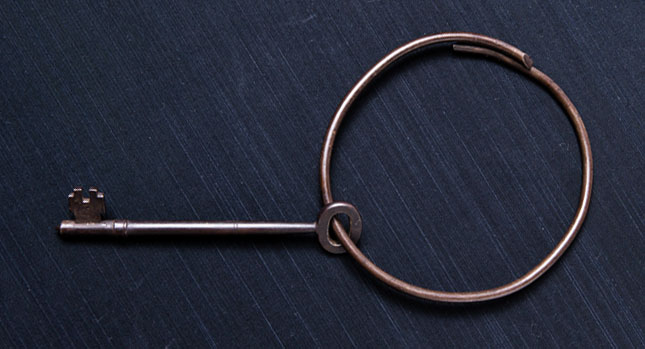 The key, thought to be made of brass, measures five inches in length and hangs on a circular ring measuring five inches across. Photo by Joanna Chattman