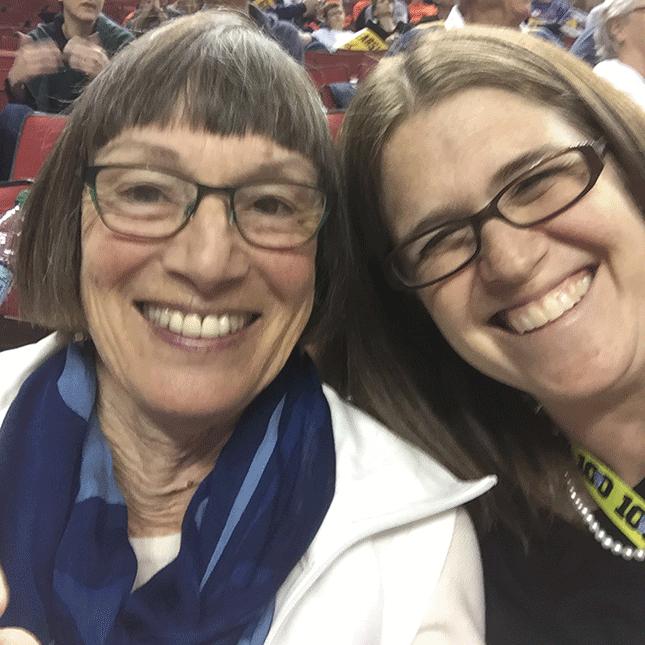 Margaret (Meg) Conkey ’65 (left) and Jenny Simon-O'Neill ’02 (right) at the Pac-12 women's basketball tournament