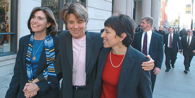 Ellen Wade ’70 (left) and Maureen Brodoff celebrated their marriage in 2004; Bottom: Wade (right) with fellow plaintiffs in the case that legalized same-sex marriage in Massachusetts.