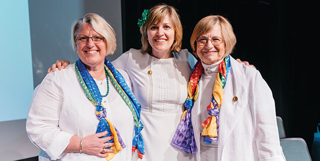 Carrie Field ’97 (center) with Acting President Sonya Stephens and Alumnae Association President Marcia Brumit Kropf ’67