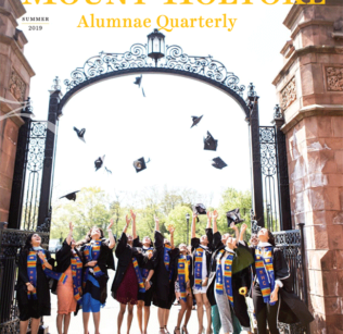 The cover of the summer 2019 Quarterly shows graduates standing at the Gates, tossing their caps into the air.